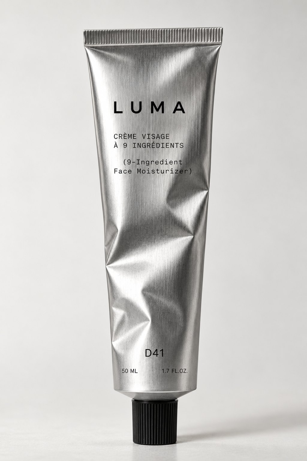LUMA Gesichtscreme D41: zerknitterte Aluminiumtube mit schwarzer Kappe