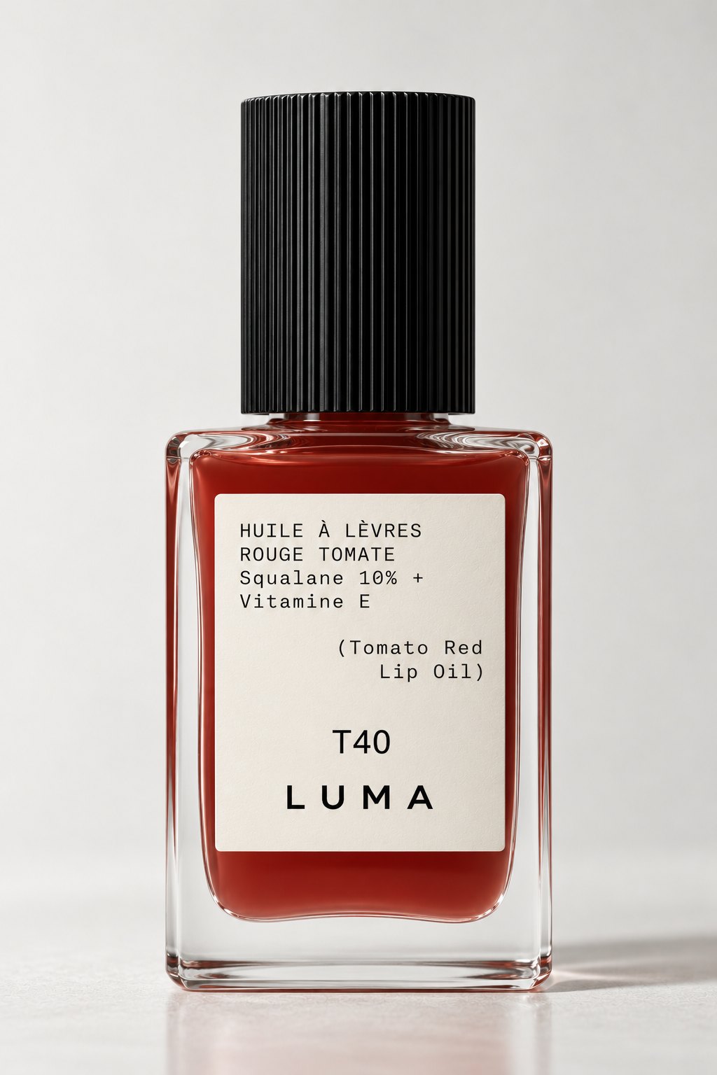 LUMA Lippenöl T40 in Tomatenrot, Glasflasche mit schwarzer Riffelkappe