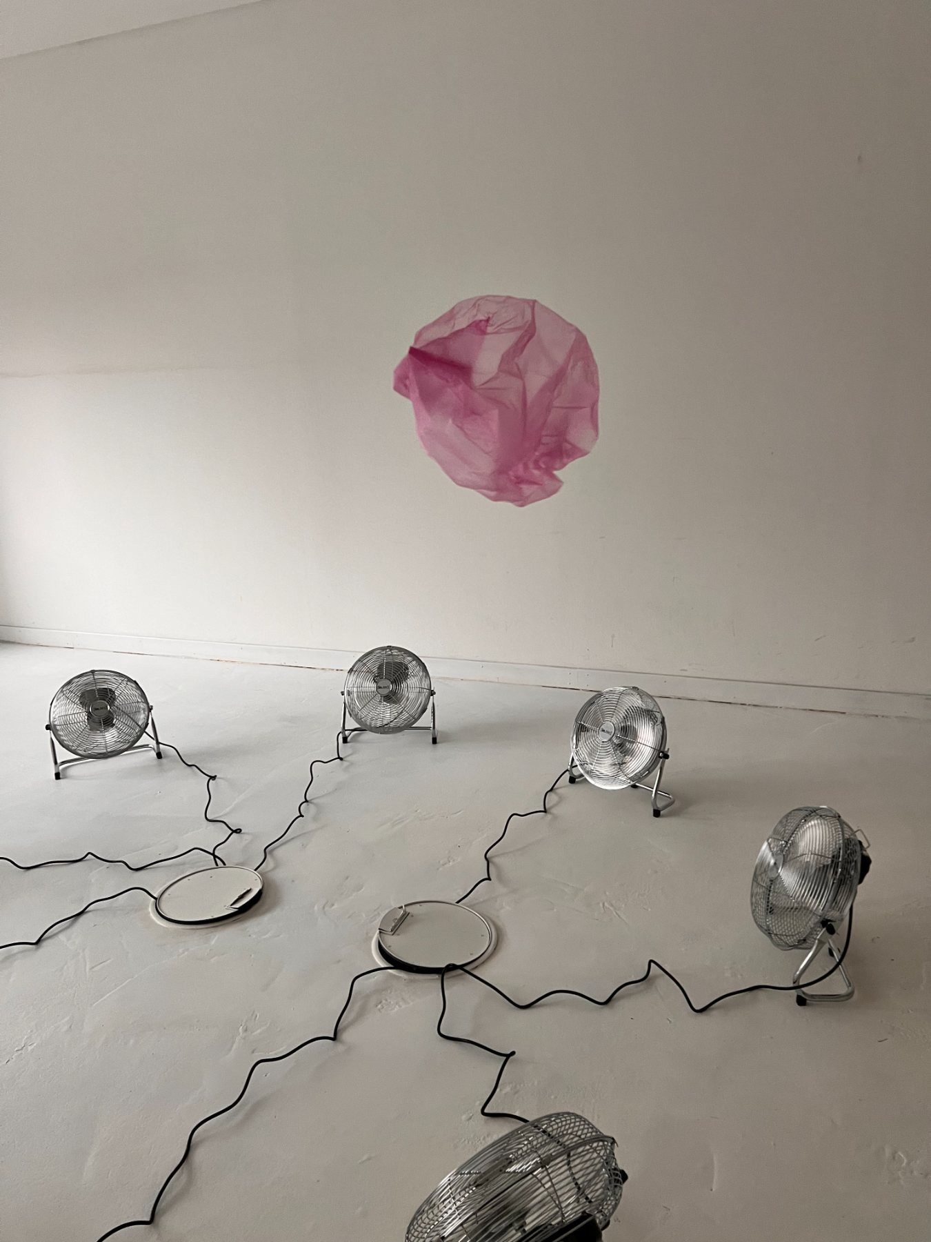 uvdl: installation with eight industrial fans and a floating plastic bag, Kai Schmidt