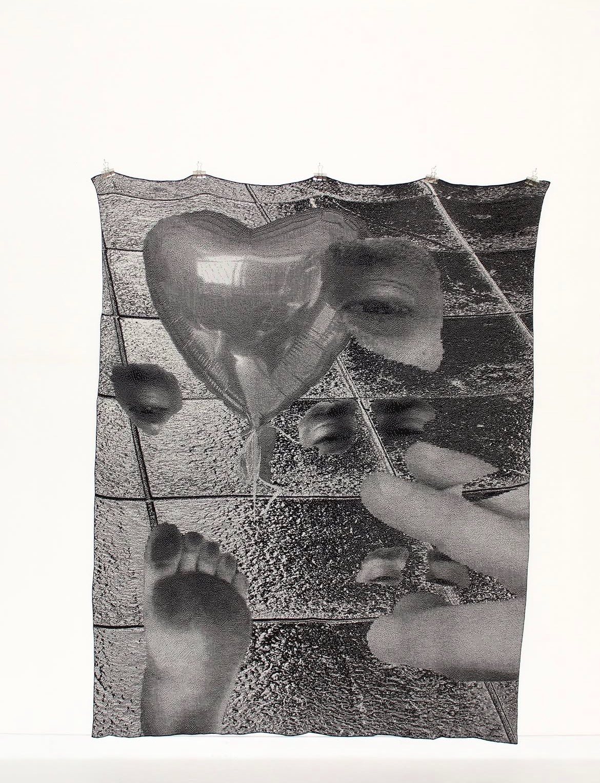 Woven Sheets: heart balloon dragged across pavement